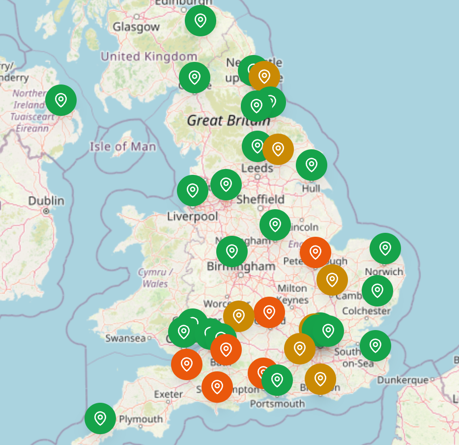 FloodWatch portfolio map showing colour-coded flood risk pins across England, Wales and Scotland